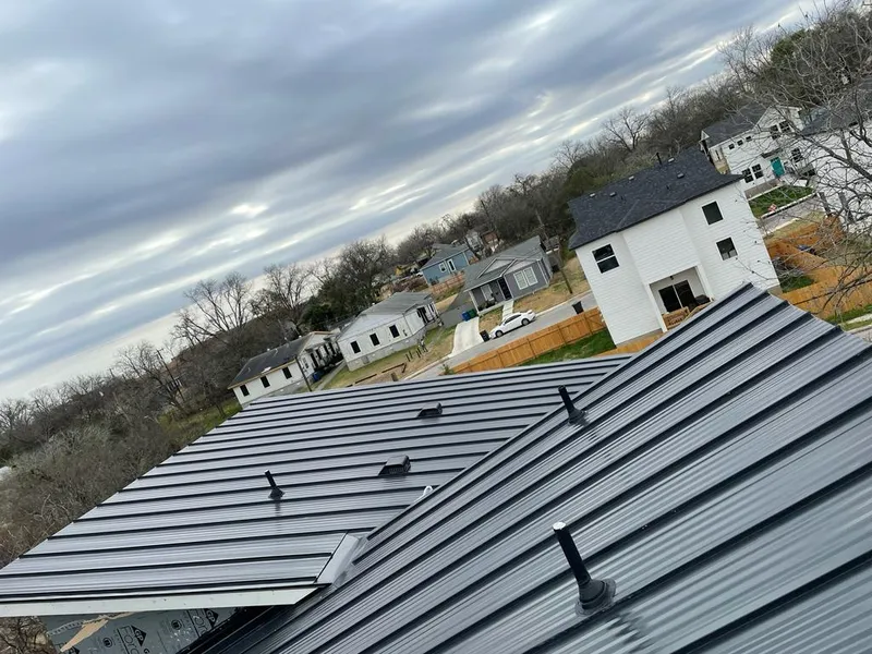 Standing seam metal roof panels with vents for Skylight Repair in East Riverdale